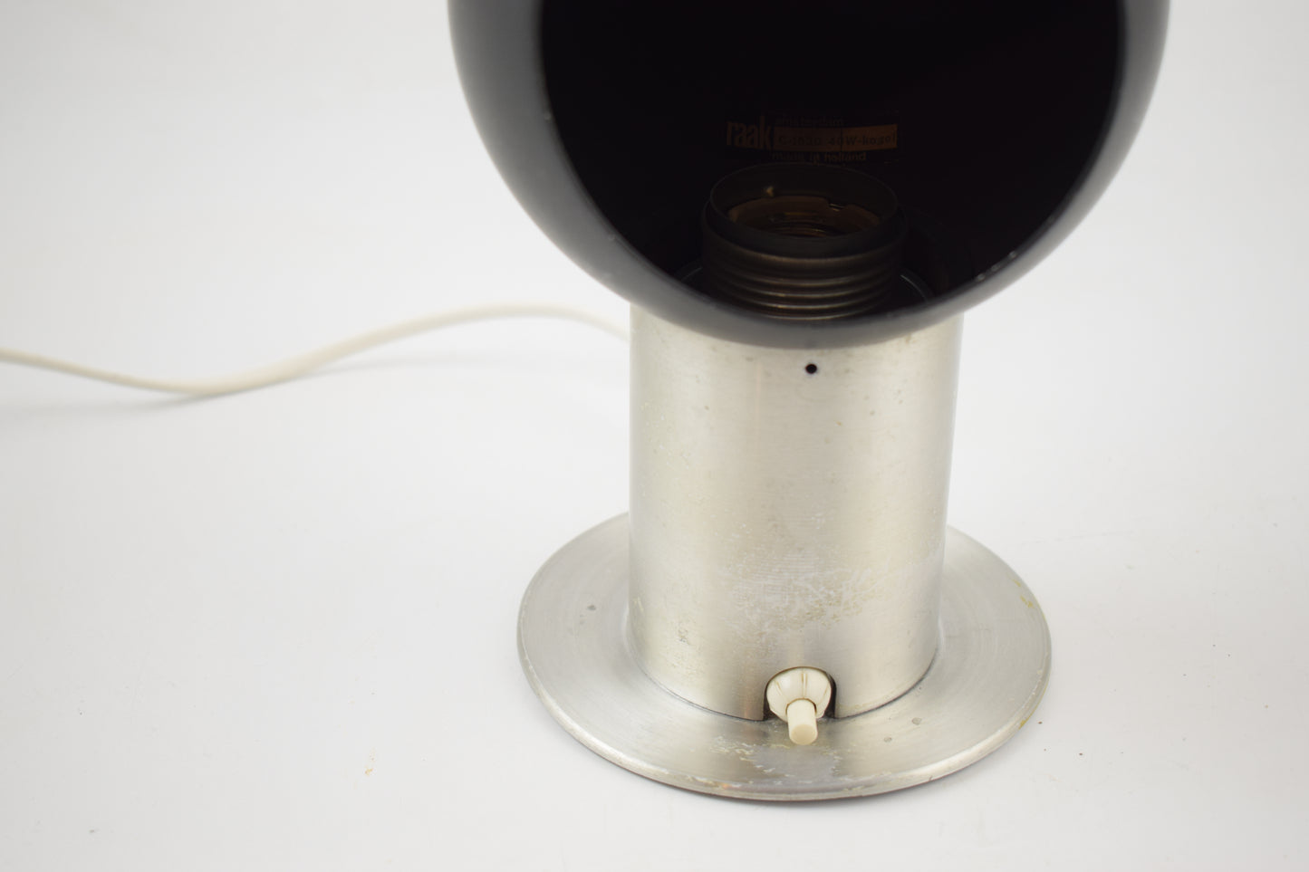 Raak C-1530 kogel, lichtkogel lamp, lightbullet lamp, raak sconces, bedside lamp, mid centrury modern, bedroom light, 1960s 1970s lamp, black metal lamp, Iconic Design, Atomic space age, Minimalist Design, Eames Era Danish