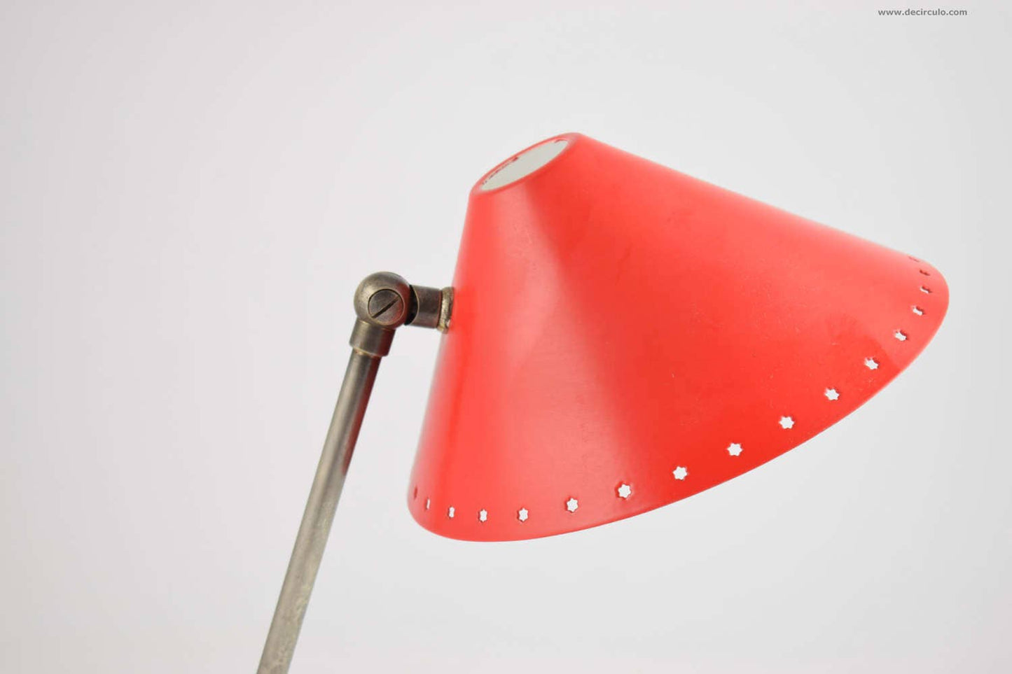 Pinocchio red wall or table lamp designed in 1956 by H.Th.A. Busquet.