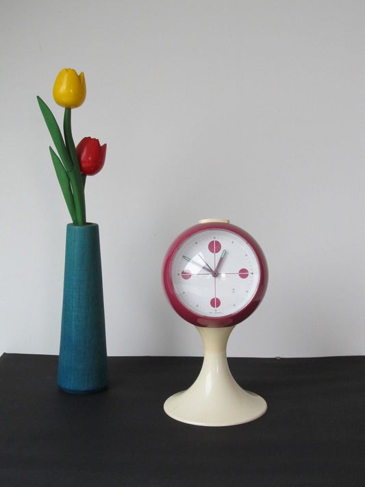 Pedestal retro alarm clock from the seventies vintage
