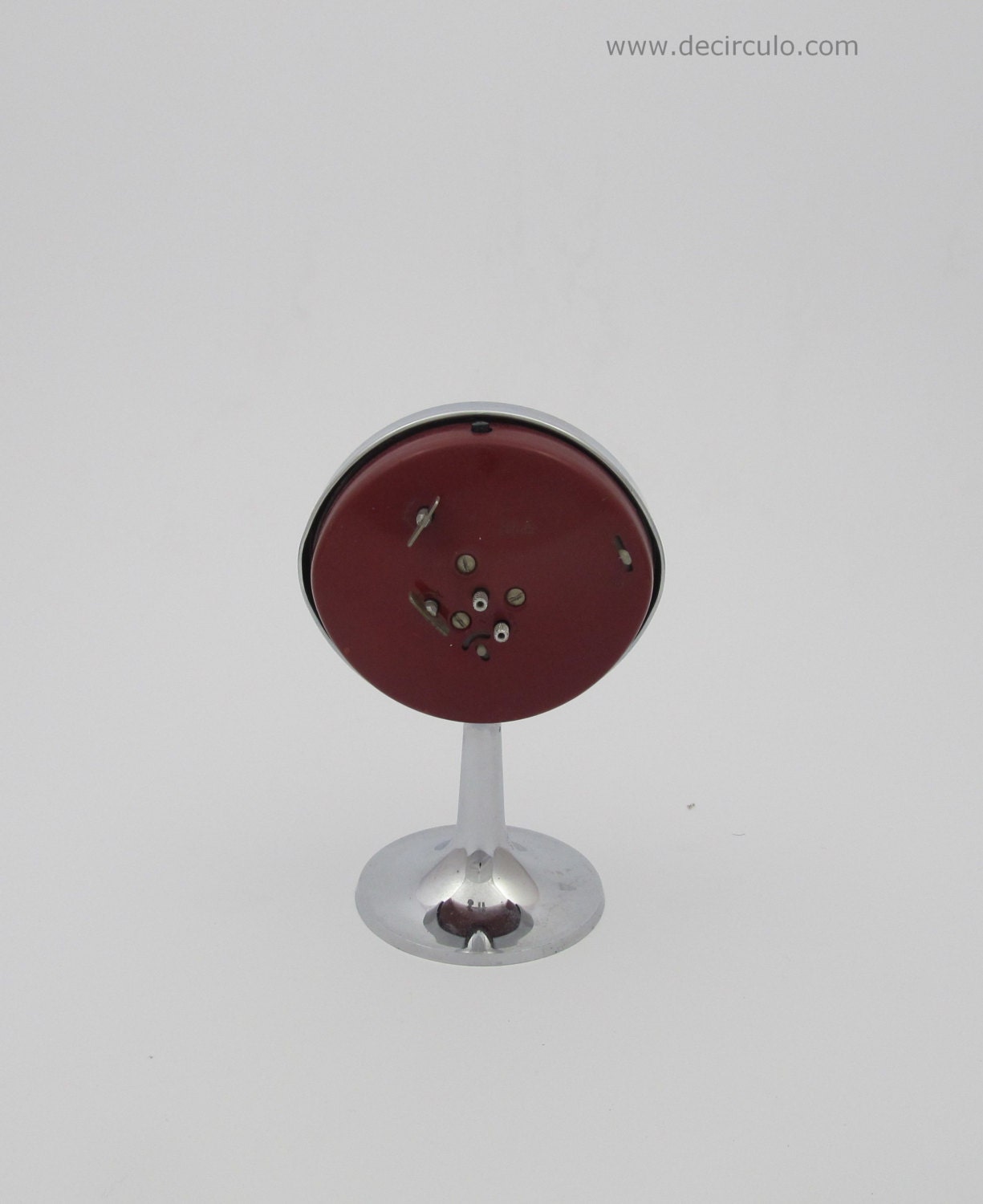 Westclox Big Ben Alarm Oval clock on tall pedestal with round base.