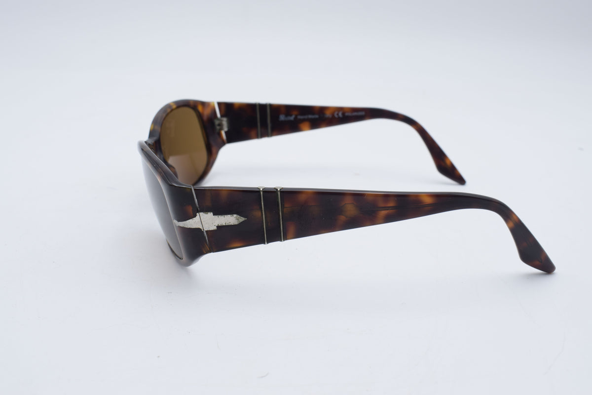 Persol 2756 s Tortoiseshell sunglasses with brown tinted lenses, photographed on a plain white background.