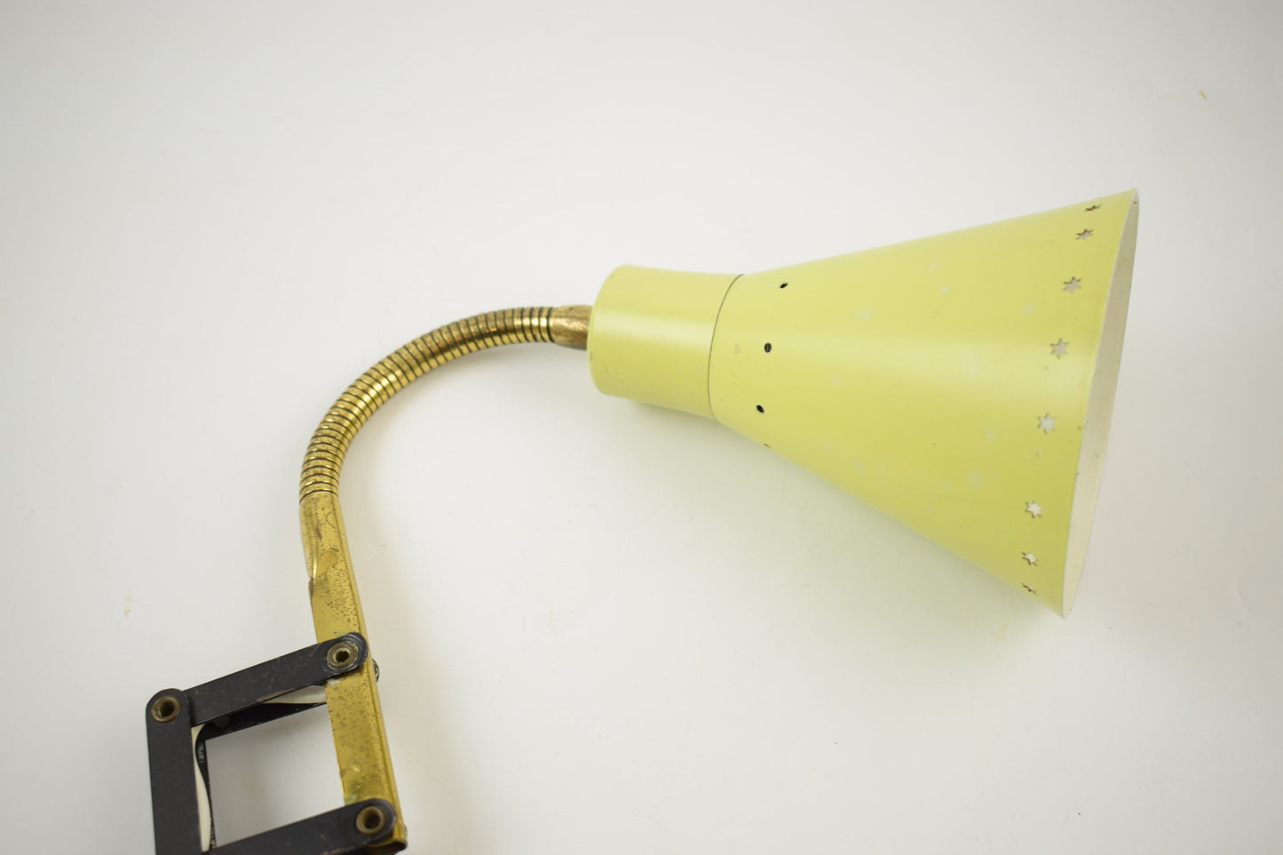 Scissors wall light. Vintage yellow harmonica or scissors wall lamp from the 60s attributed to design firm Hala