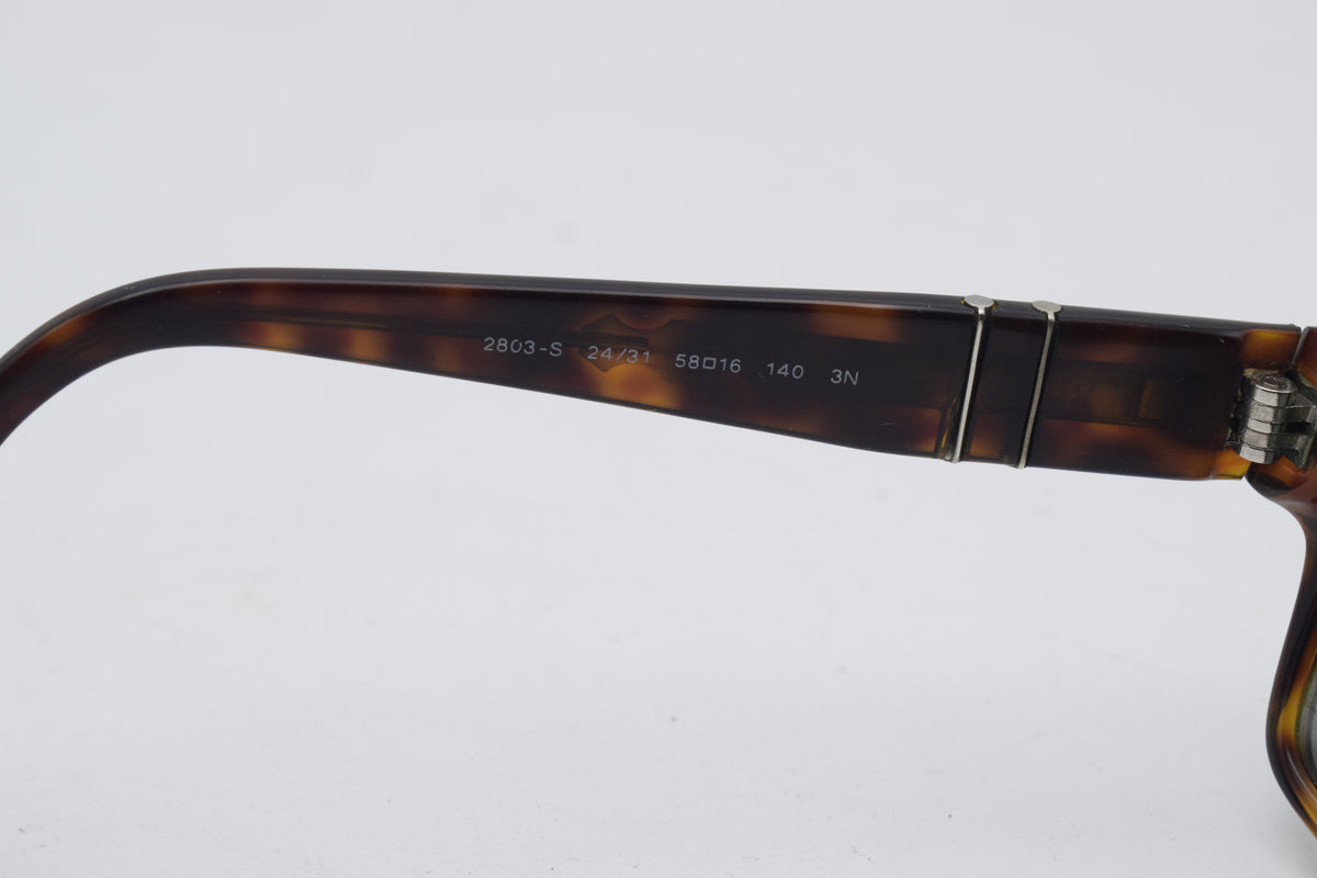 Authentic vintage Persol 2803-S tortoise sunglasses with original case. Made in Italy. Classic designer eyewear in very good vintage condition.