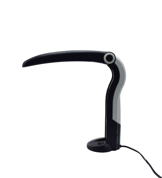 Black adjustable desk lamp on a light gray background