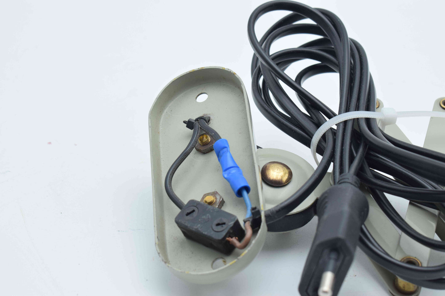 Electrical plug and socket with wiring on a white background