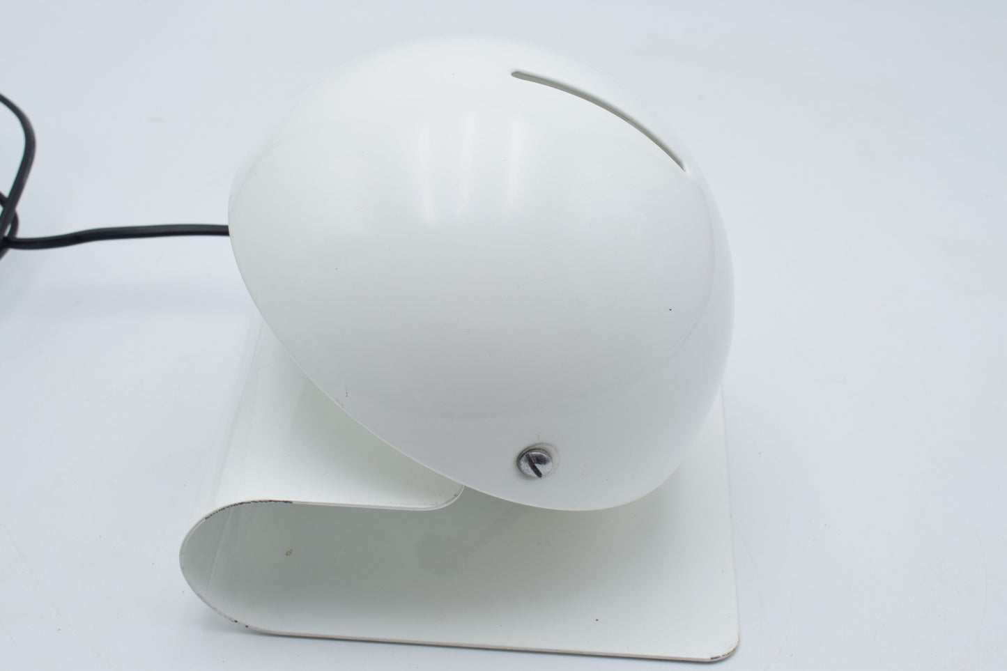 Top‑down view of the Bugia table lamp highlighting the circular form and the adjustable shade mechanism typical of 1970s Italian design