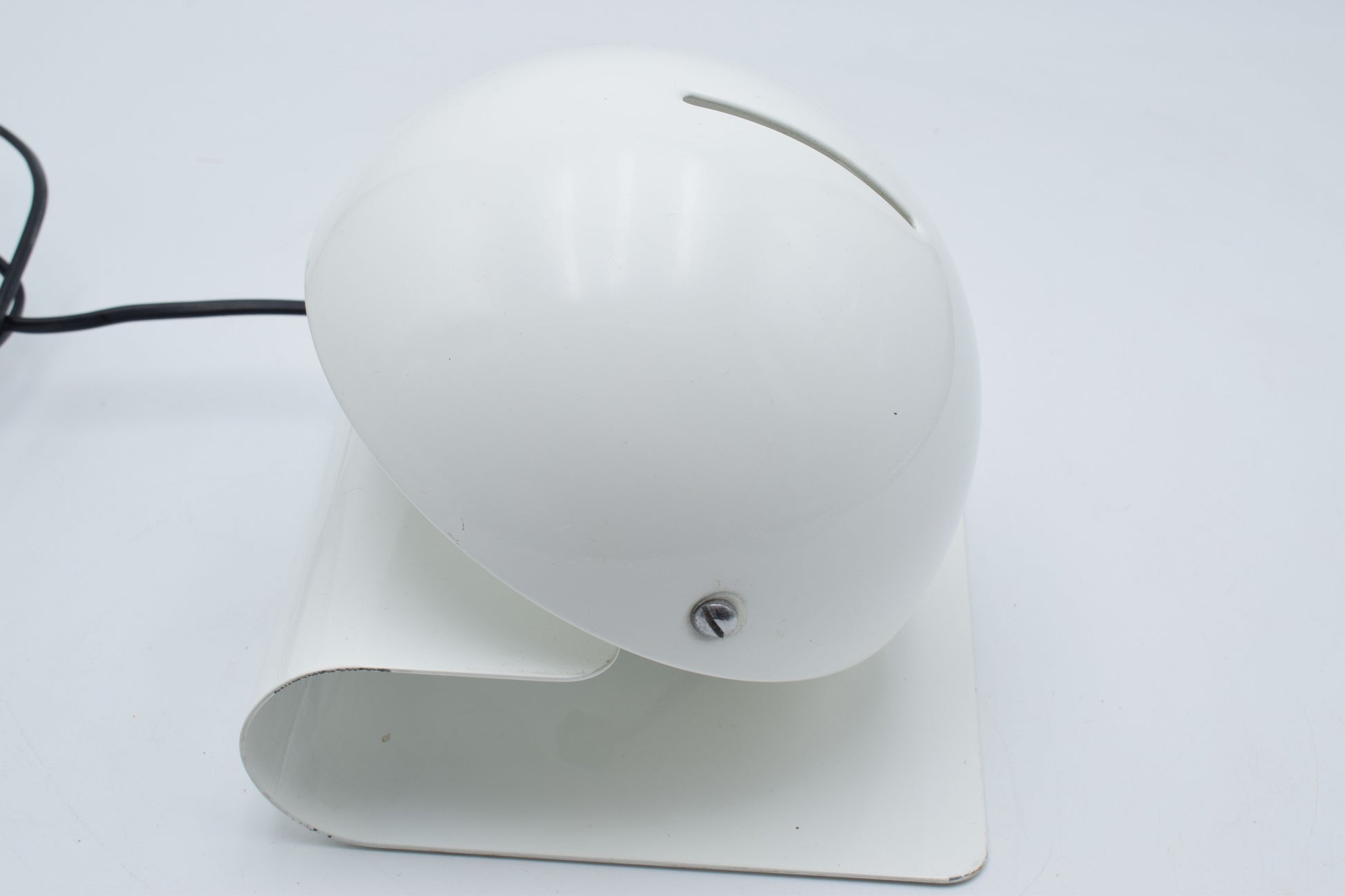 Top‑down view of the Bugia table lamp highlighting the circular form and the adjustable shade mechanism typical of 1970s Italian design