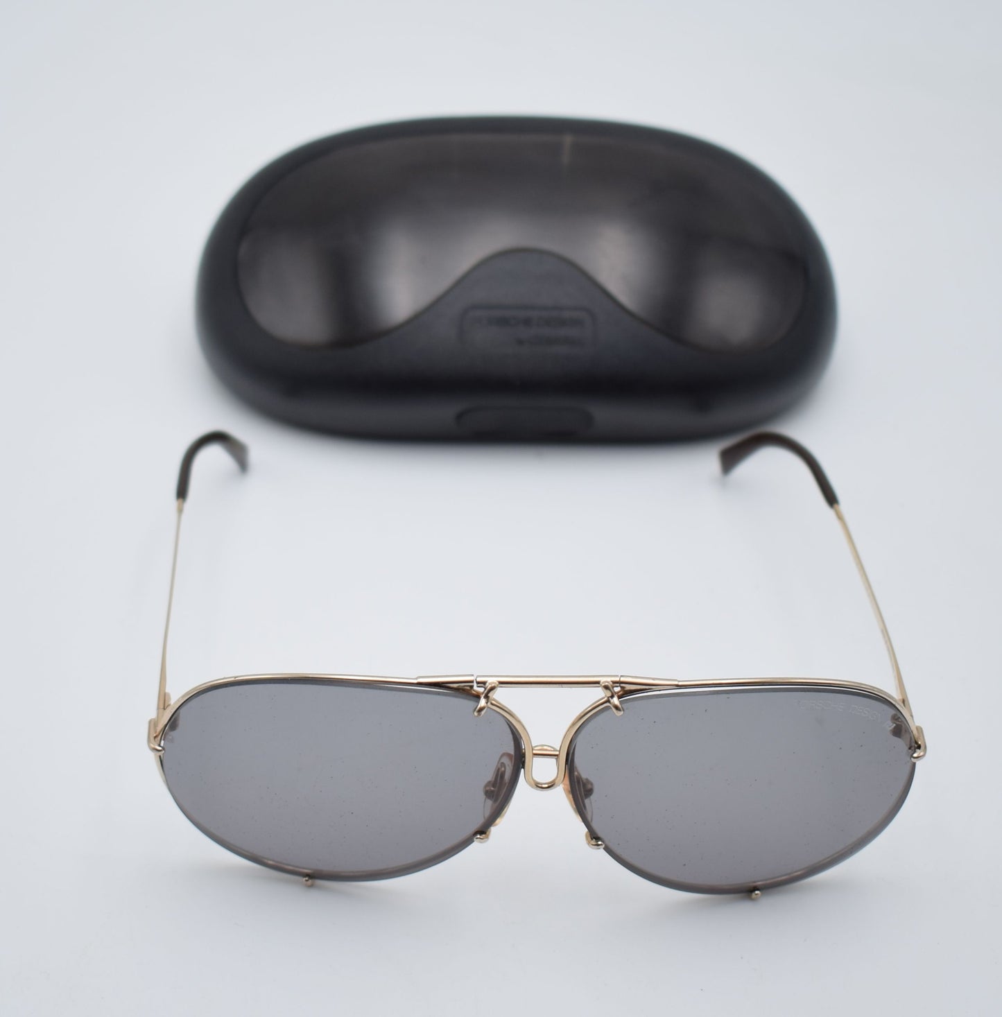 porsche sunglasses, vintage sunglasses, scarface al pacino, mafia sunglasses, 1980s style miami, miami vice, tony montana, design sunglasses, sunglases, sun glasses vintage, cartier rayban, Oakley Gucci, porsche design 5621