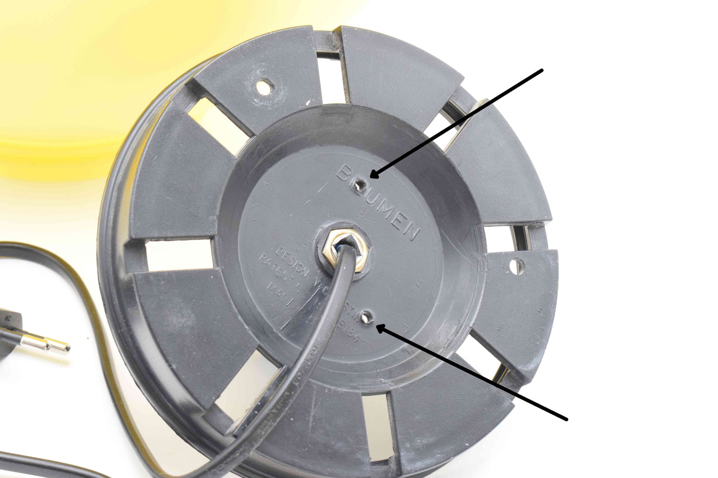 Close-up of a mechanical component with labeled parts on a white background