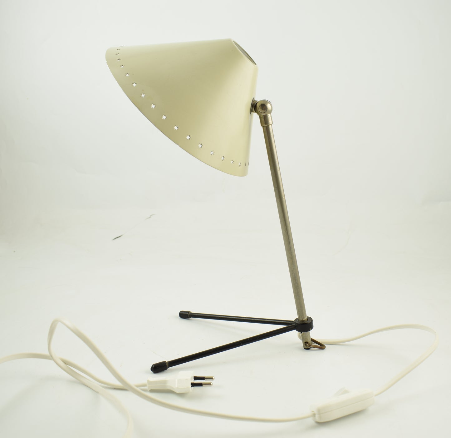 creme-white Pinocchio wall or table lamp designed in 1956 by H.Th.A. Busquet