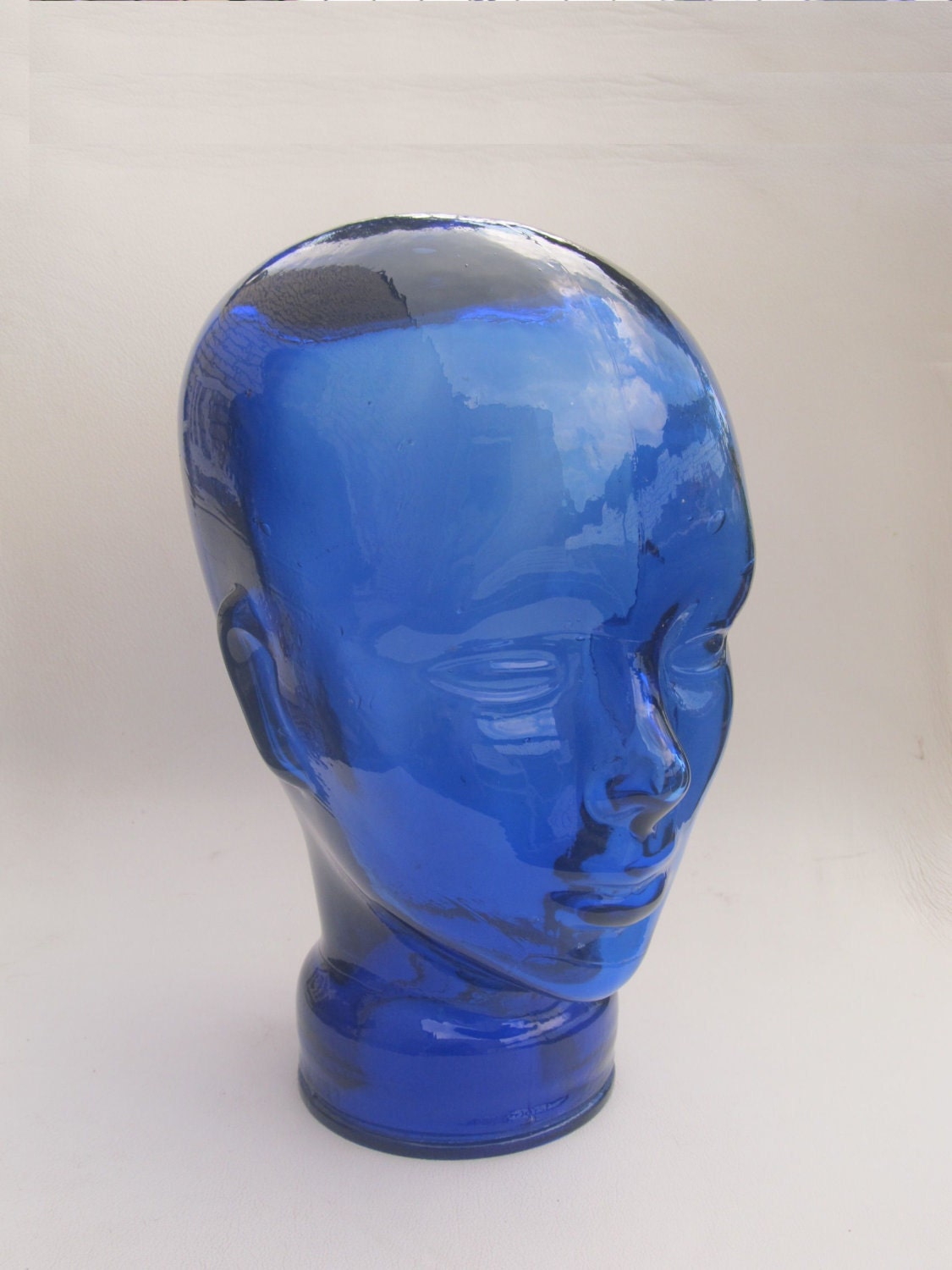 Blauw glazen hoofd uit de jaren 80, het typische hoofd uit de jaren 70 of 80 kan gebruikt worden voor je koptelefoon, pruik, zonnebril enz