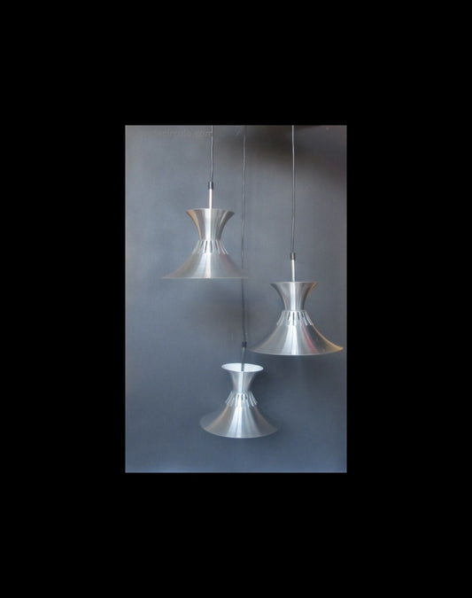 Cascade lamp with three aluminum lights cascading light from the 1970s