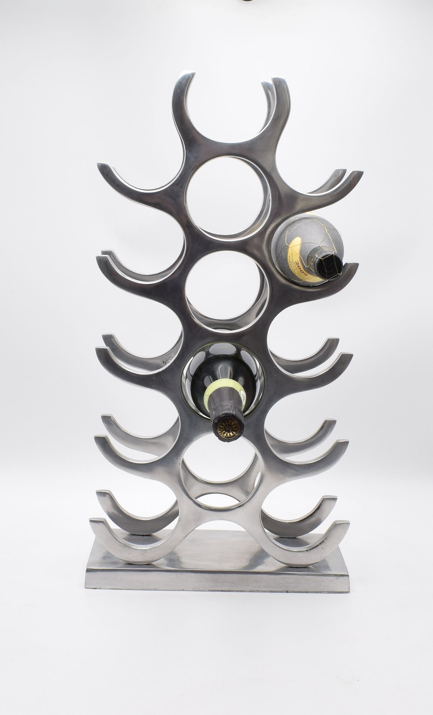 wine rack metal, michael noll, German design, Barolo italy, kitchen design, Château Margaux, Opus One, Marqués de Riscal, modernist decor, bottle holder, industrial interior, wine bottle stand, kitchen storage