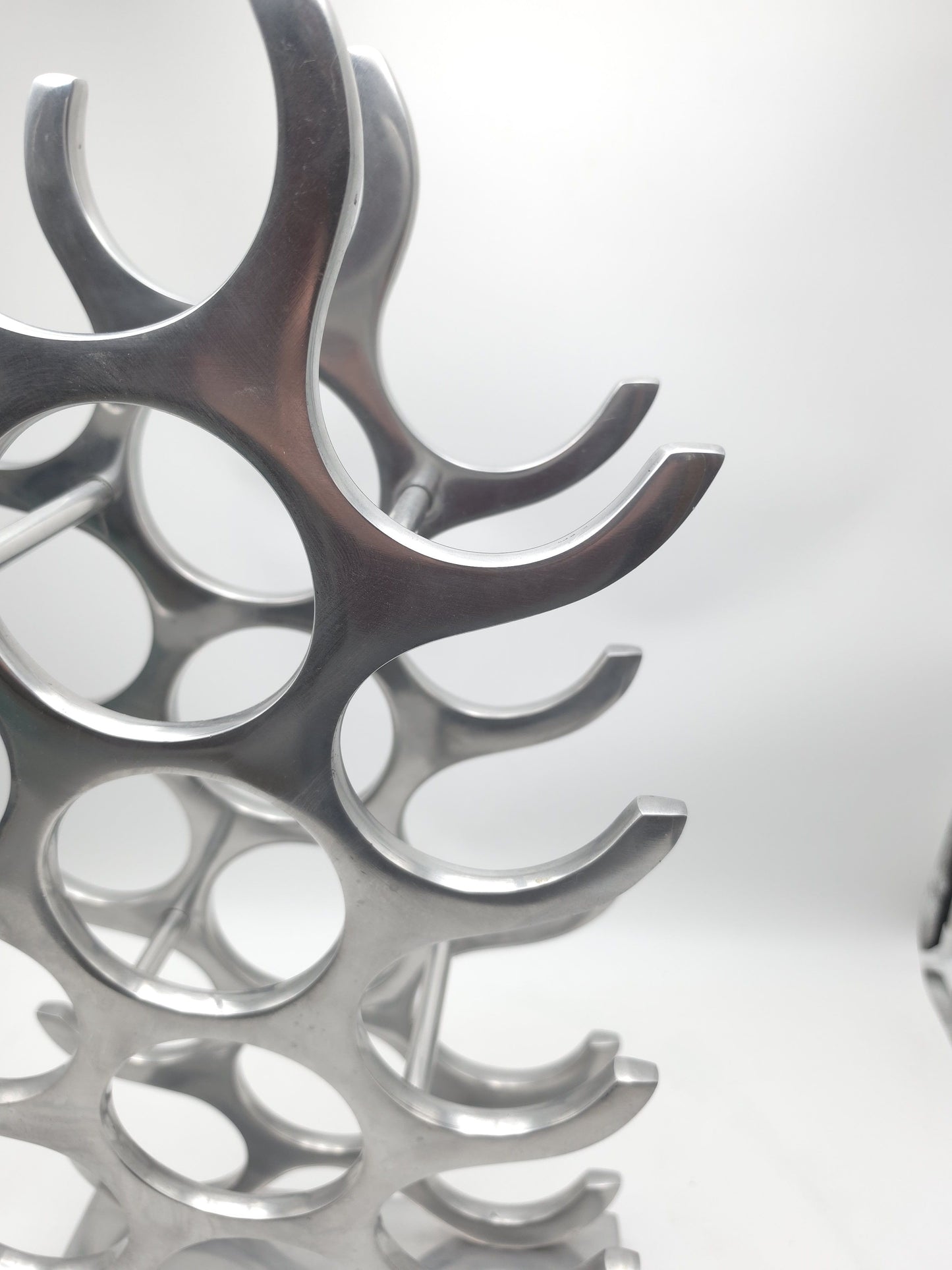 wine rack metal, michael noll, German design, Barolo italy, kitchen design, Château Margaux, Opus One, Marqués de Riscal, modernist decor, bottle holder, industrial interior, wine bottle stand, kitchen storage