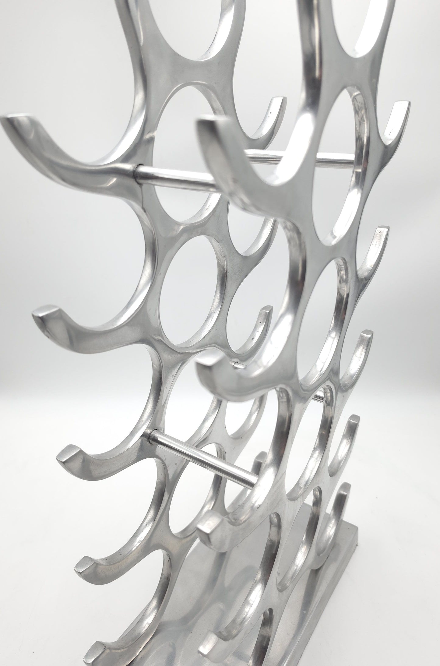 wine rack metal, michael noll, German design, Barolo italy, kitchen design, Château Margaux, Opus One, Marqués de Riscal, modernist decor, bottle holder, industrial interior, wine bottle stand, kitchen storage