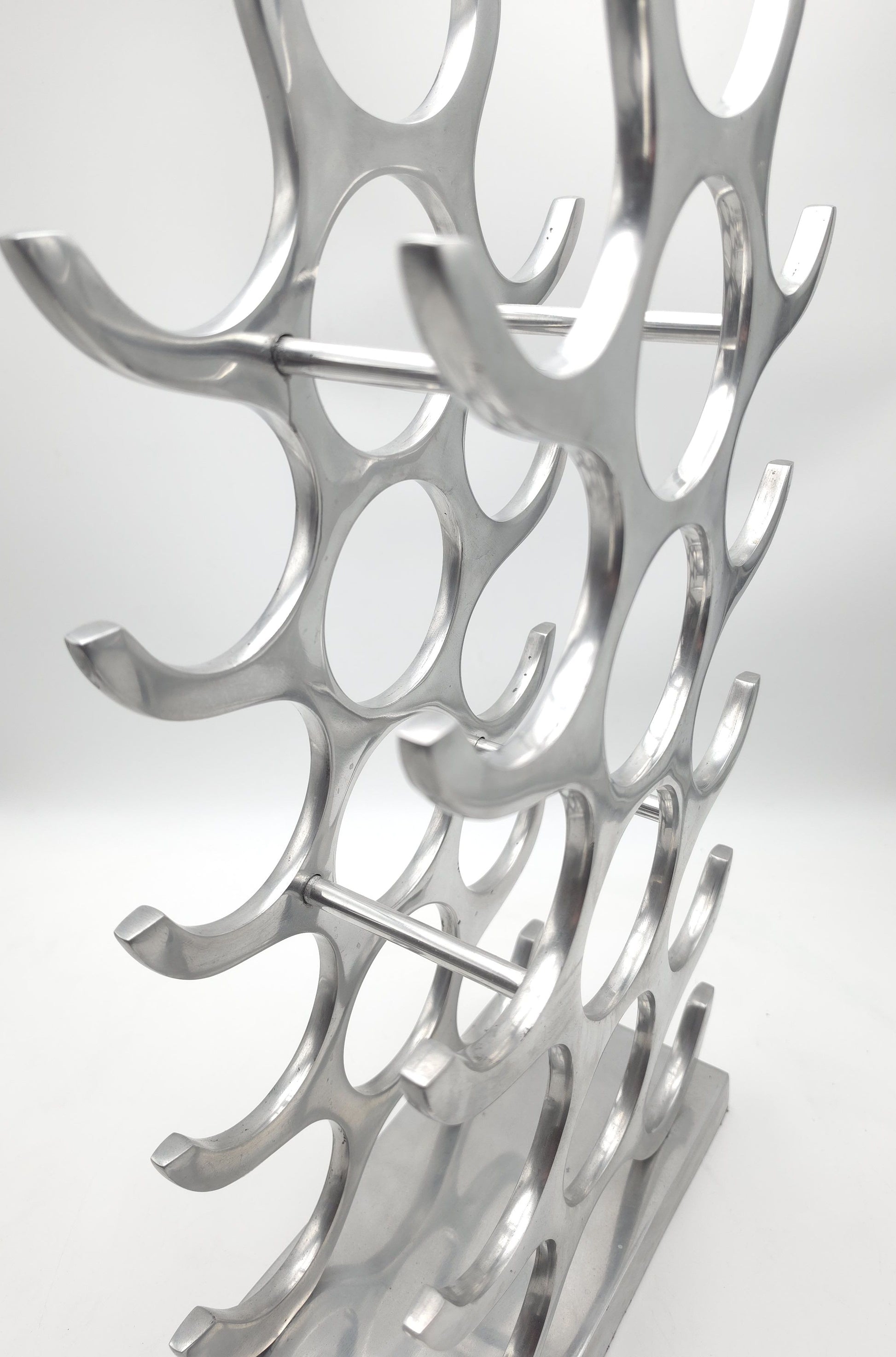 wine rack metal, michael noll, German design, Barolo italy, kitchen design, Château Margaux, Opus One, Marqués de Riscal, modernist decor, bottle holder, industrial interior, wine bottle stand, kitchen storage