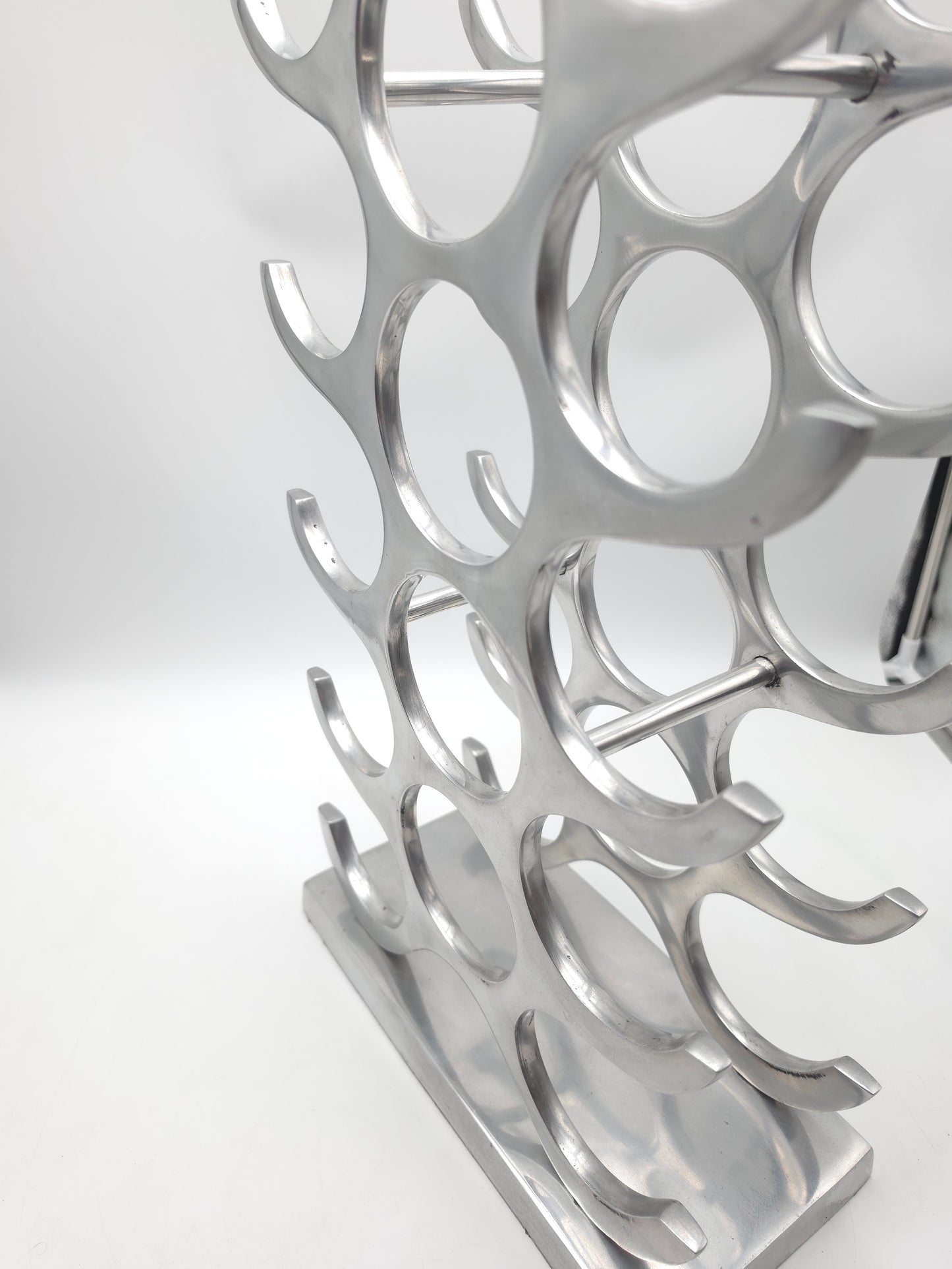 wine rack metal, michael noll, German design, Barolo italy, kitchen design, Château Margaux, Opus One, Marqués de Riscal, modernist decor, bottle holder, industrial interior, wine bottle stand, kitchen storage