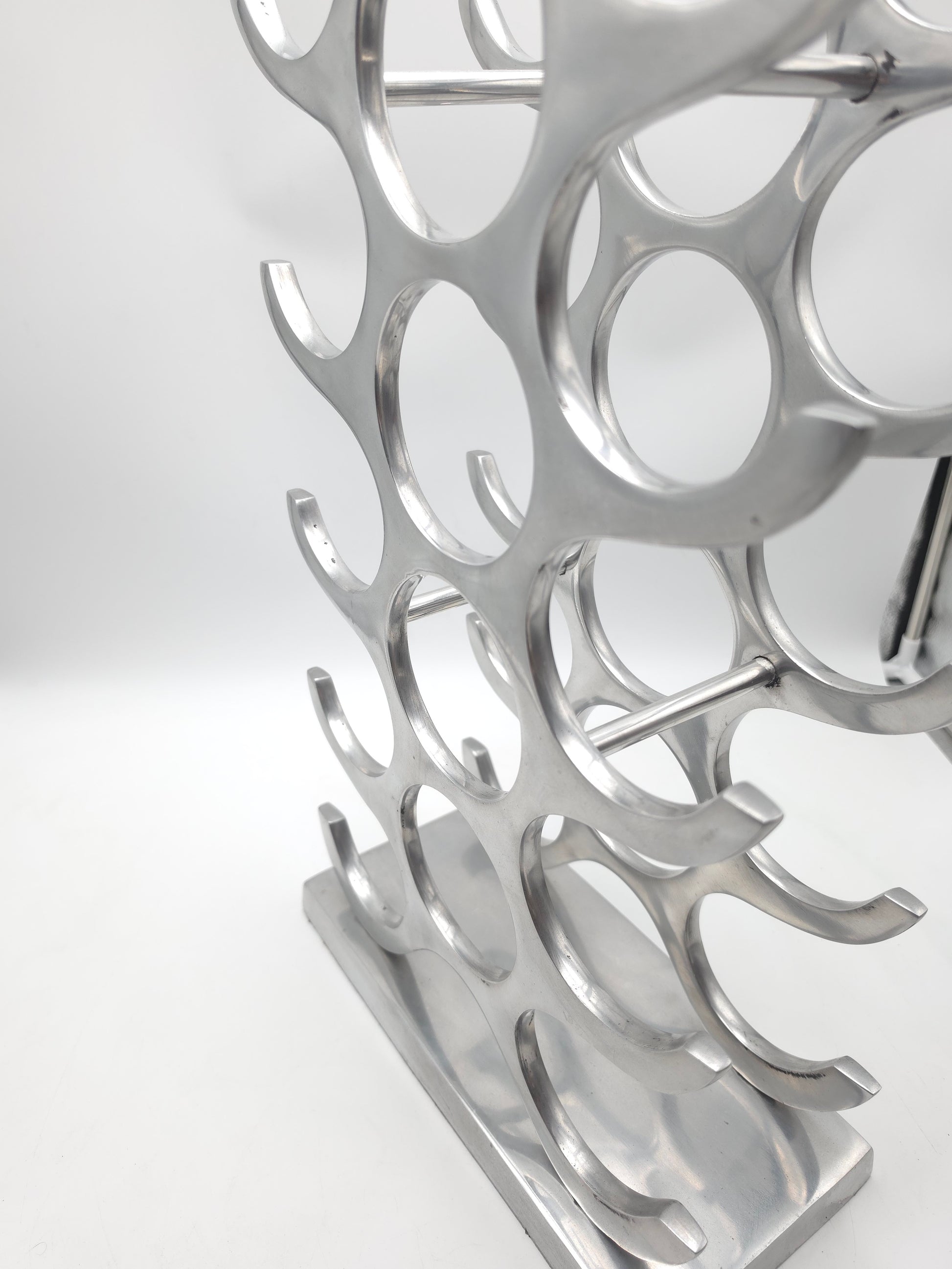 wine rack metal, michael noll, German design, Barolo italy, kitchen design, Château Margaux, Opus One, Marqués de Riscal, modernist decor, bottle holder, industrial interior, wine bottle stand, kitchen storage