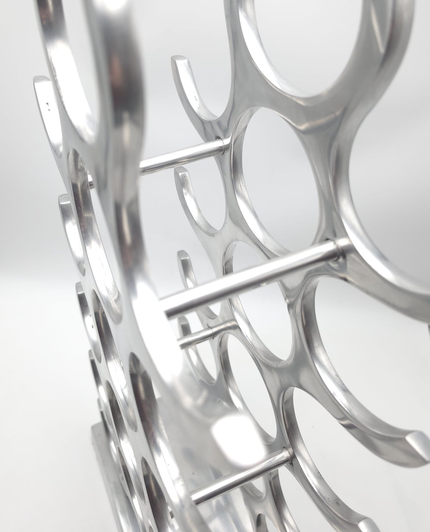 wine rack metal, michael noll, German design, Barolo italy, kitchen design, Château Margaux, Opus One, Marqués de Riscal, modernist decor, bottle holder, industrial interior, wine bottle stand, kitchen storage