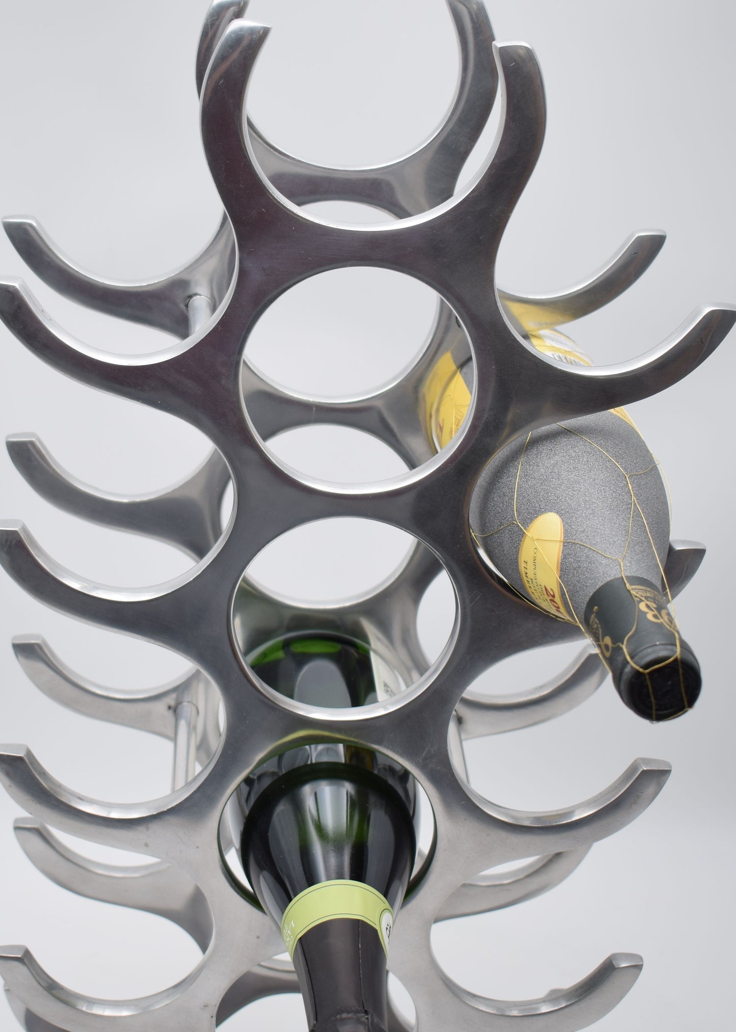 wine rack metal, michael noll, German design, Barolo italy, kitchen design, Château Margaux, Opus One, Marqués de Riscal, modernist decor, bottle holder, industrial interior, wine bottle stand, kitchen storage