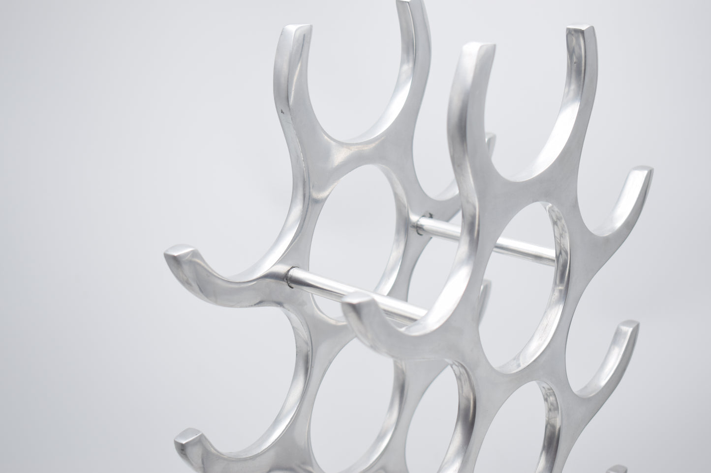 wine rack metal, michael noll, German design, Barolo italy, kitchen design, Château Margaux, Opus One, Marqués de Riscal, modernist decor, bottle holder, industrial interior, wine bottle stand, kitchen storage