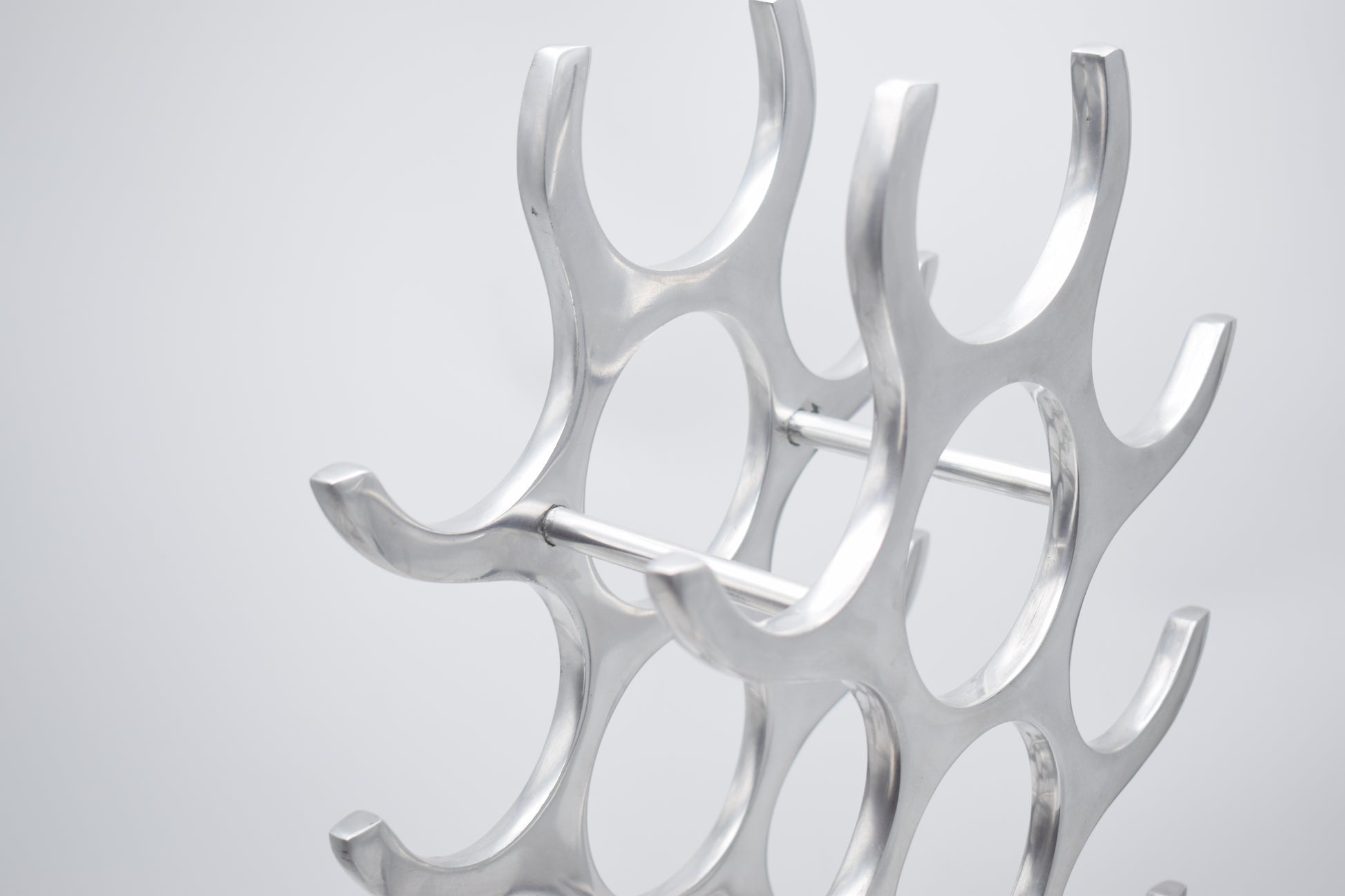 wine rack metal, michael noll, German design, Barolo italy, kitchen design, Château Margaux, Opus One, Marqués de Riscal, modernist decor, bottle holder, industrial interior, wine bottle stand, kitchen storage