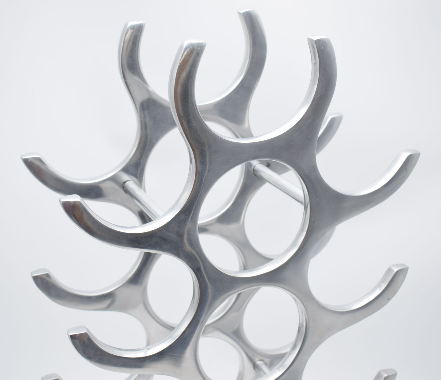 wine rack metal, michael noll, German design, Barolo italy, kitchen design, Château Margaux, Opus One, Marqués de Riscal, modernist decor, bottle holder, industrial interior, wine bottle stand, kitchen storage