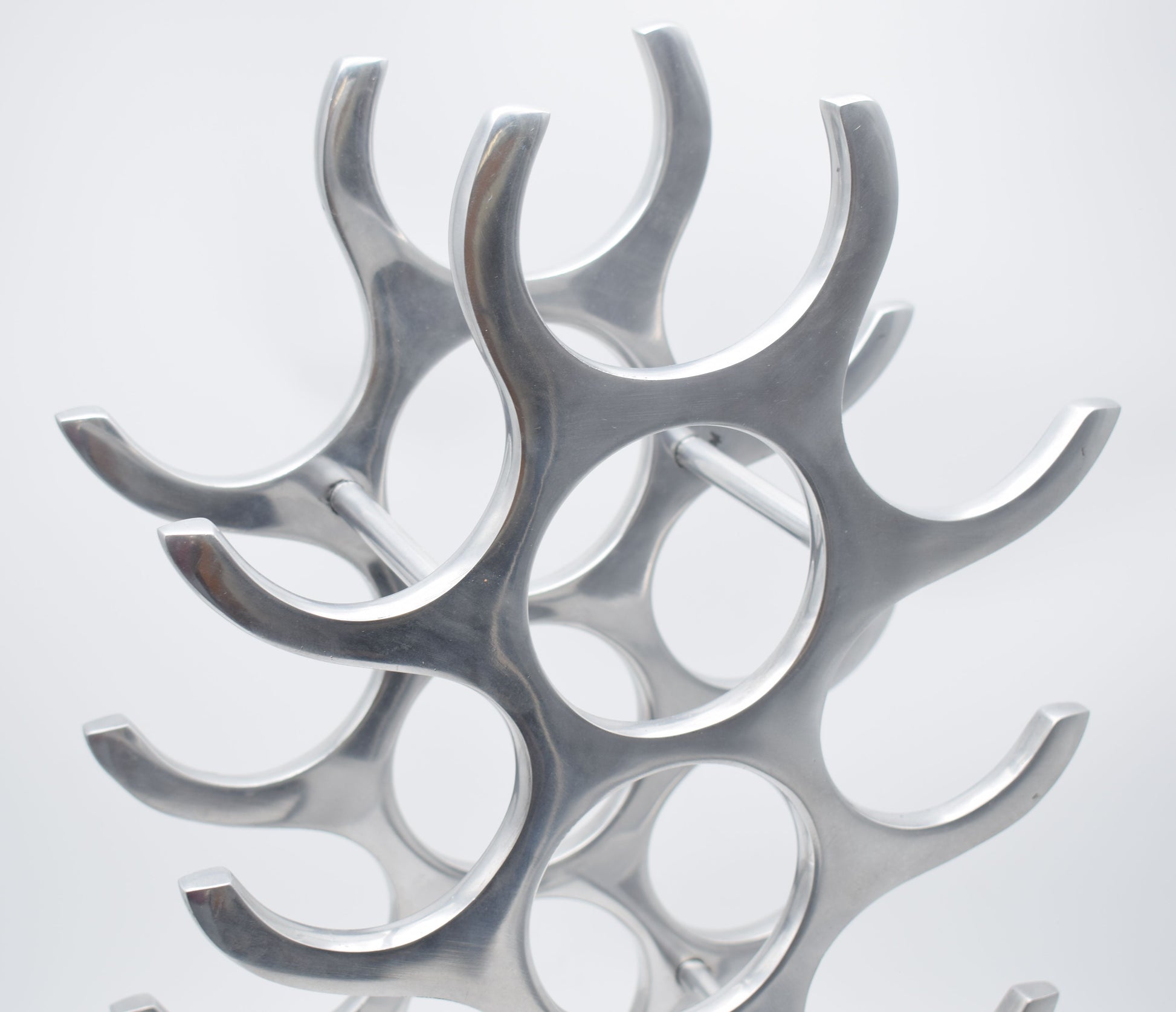 wine rack metal, michael noll, German design, Barolo italy, kitchen design, Château Margaux, Opus One, Marqués de Riscal, modernist decor, bottle holder, industrial interior, wine bottle stand, kitchen storage