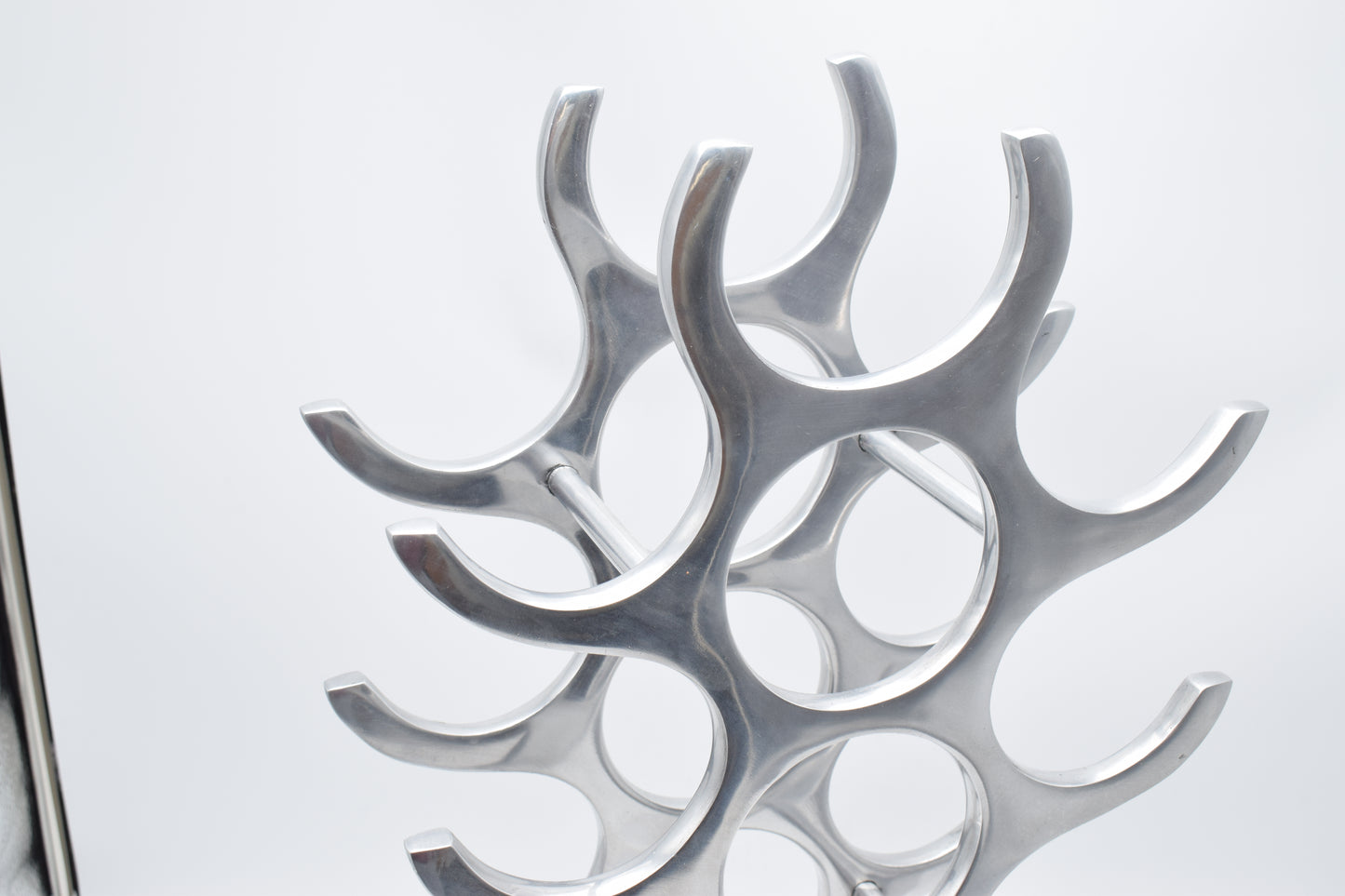 wine rack metal, michael noll, German design, Barolo italy, kitchen design, Château Margaux, Opus One, Marqués de Riscal, modernist decor, bottle holder, industrial interior, wine bottle stand, kitchen storage