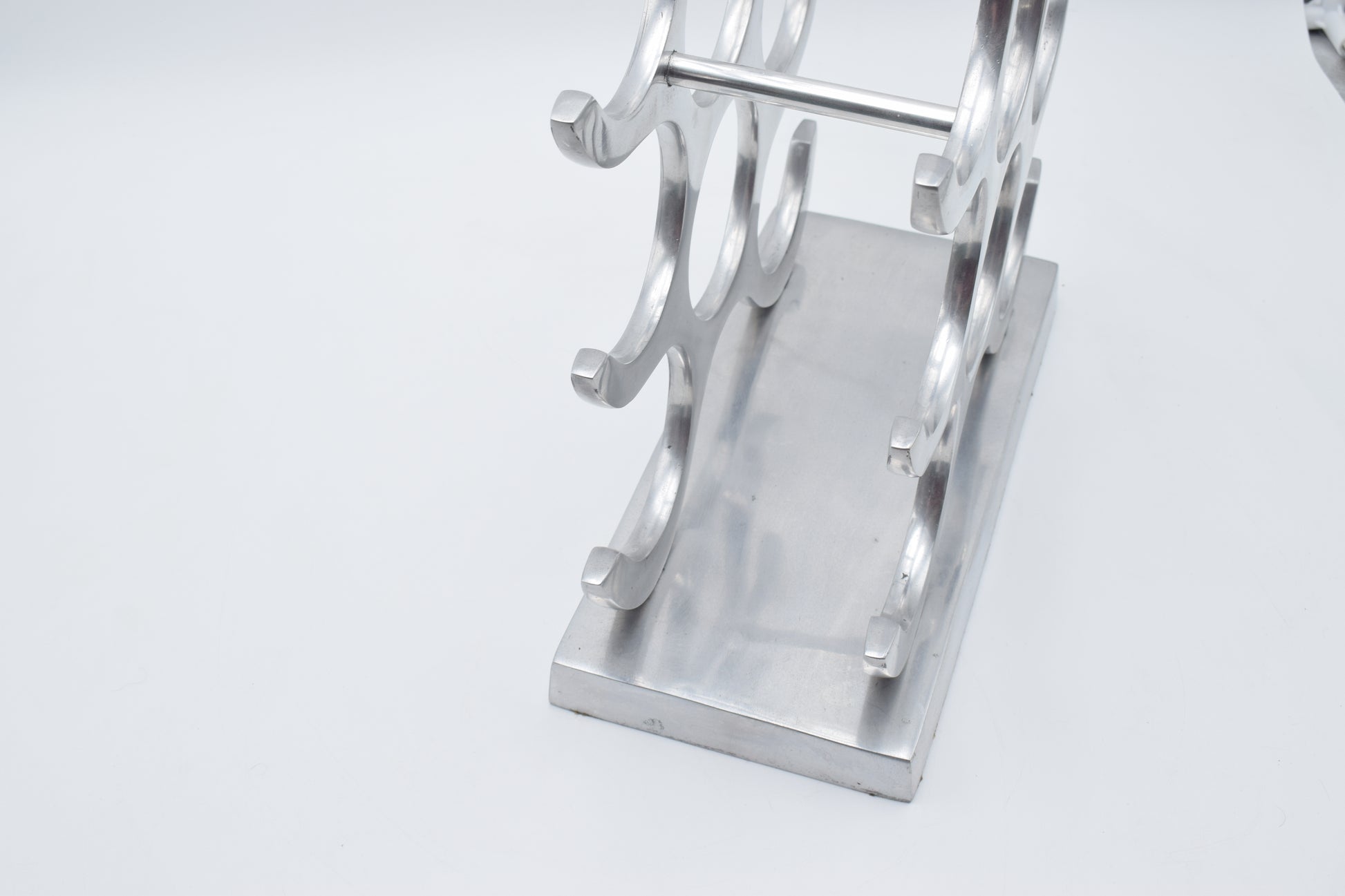 wine rack metal, michael noll, German design, Barolo italy, kitchen design, Château Margaux, Opus One, Marqués de Riscal, modernist decor, bottle holder, industrial interior, wine bottle stand, kitchen storage