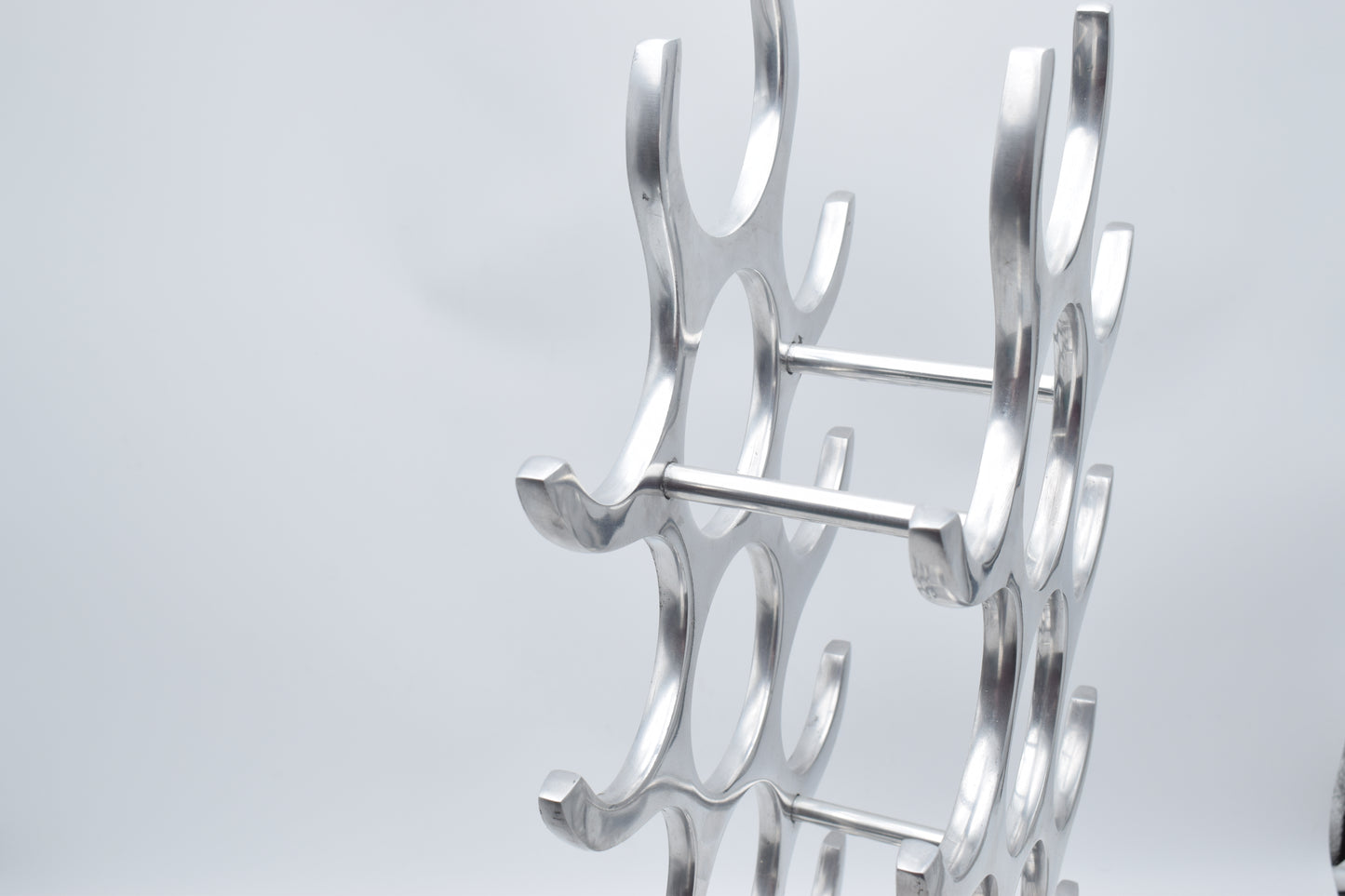 wine rack metal, michael noll, German design, Barolo italy, kitchen design, Château Margaux, Opus One, Marqués de Riscal, modernist decor, bottle holder, industrial interior, wine bottle stand, kitchen storage