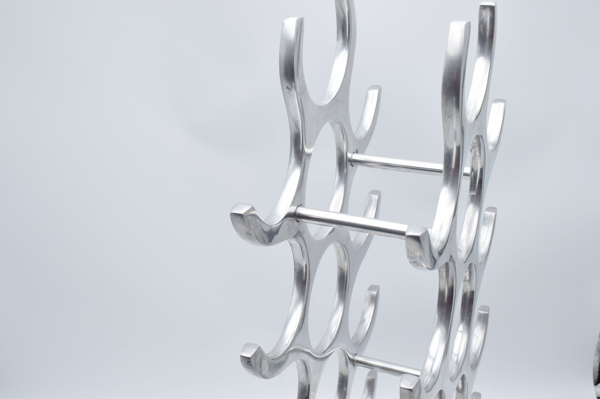 wine rack metal, michael noll, German design, Barolo italy, kitchen design, Château Margaux, Opus One, Marqués de Riscal, modernist decor, bottle holder, industrial interior, wine bottle stand, kitchen storage