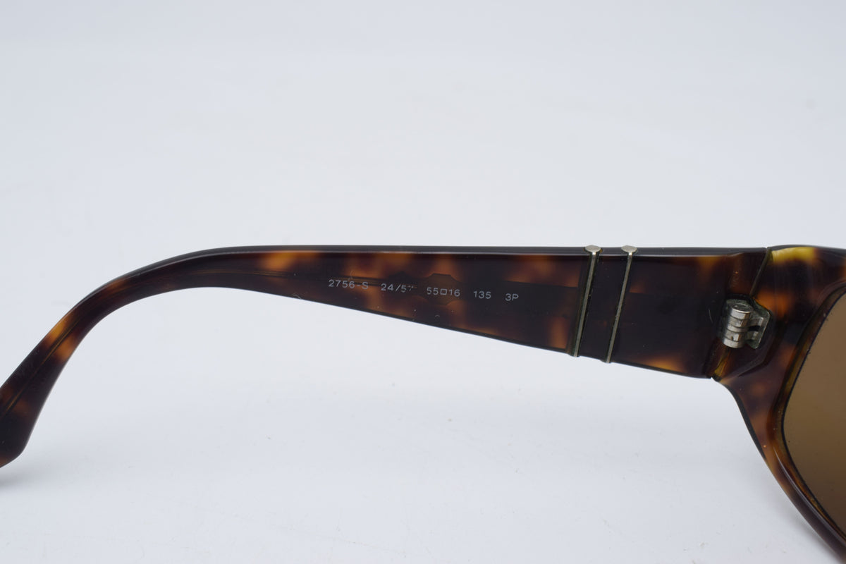 Persol 2756 s Tortoiseshell sunglasses with brown tinted lenses, photographed on a plain white background.