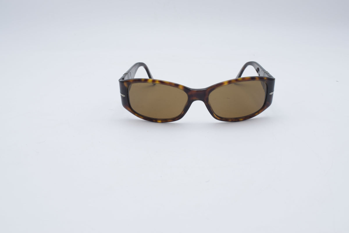 Persol 2756 s Tortoiseshell sunglasses with brown tinted lenses, photographed on a plain white background.