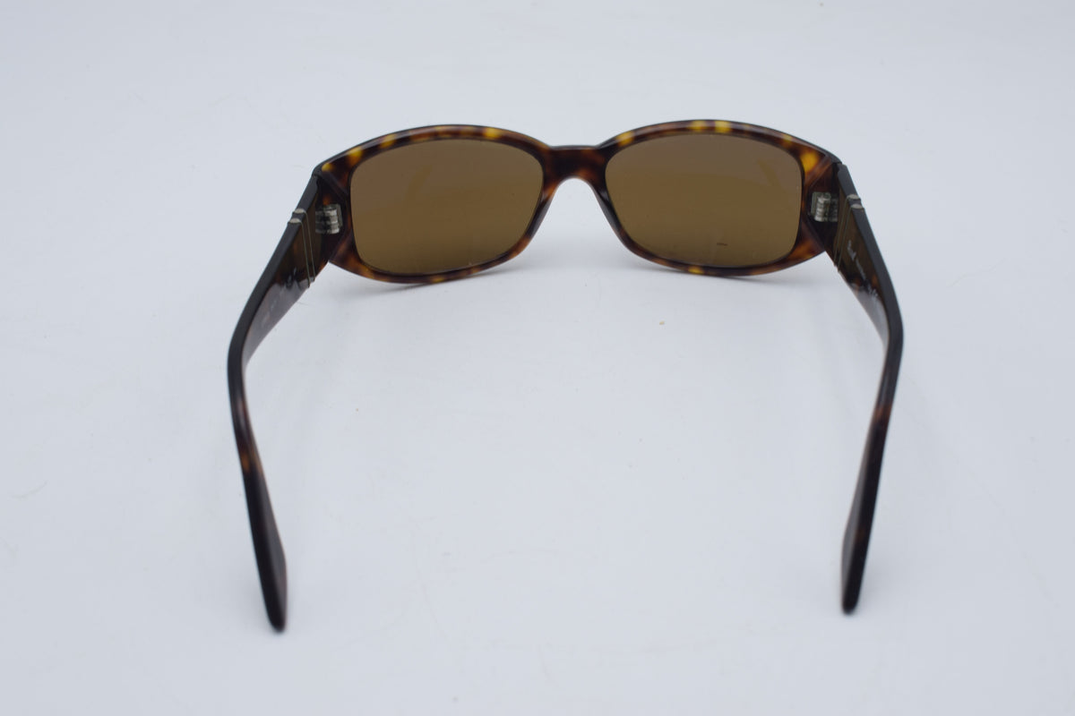 Persol 2756 s Tortoiseshell sunglasses with brown tinted lenses, photographed on a plain white background.