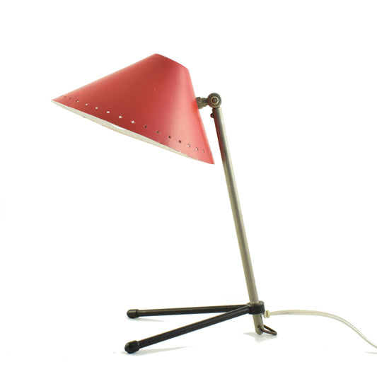 Red Pinocchio wall or table lamp designed in 1956 by H.Th.A. Busquet