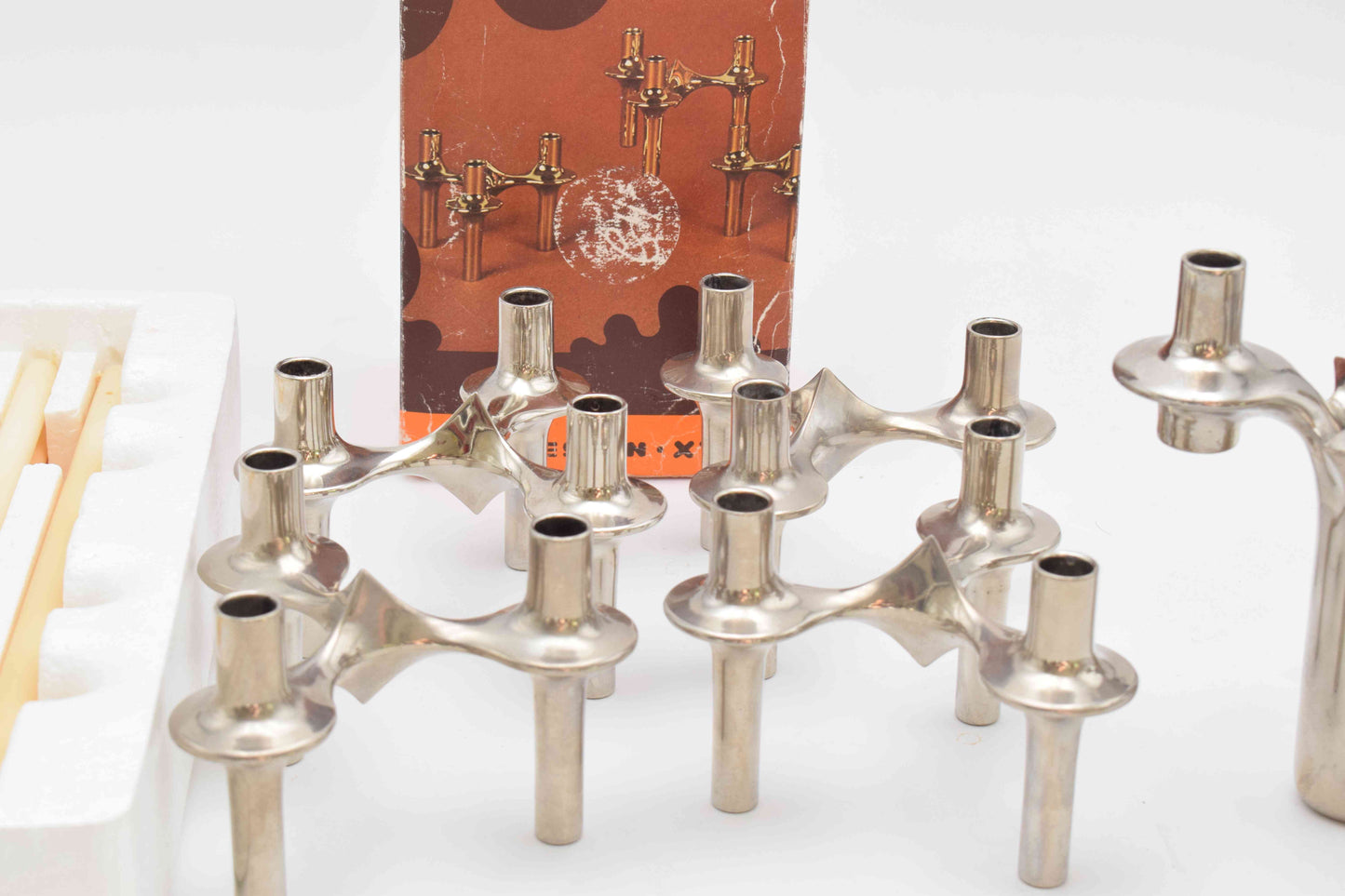 candle holders, nagel, eames era, candles, candle sticks, space age, mid century, midcentury modern, BMF, mad men, chrome home decor, MICHAEL ARAM, AERIN lauder