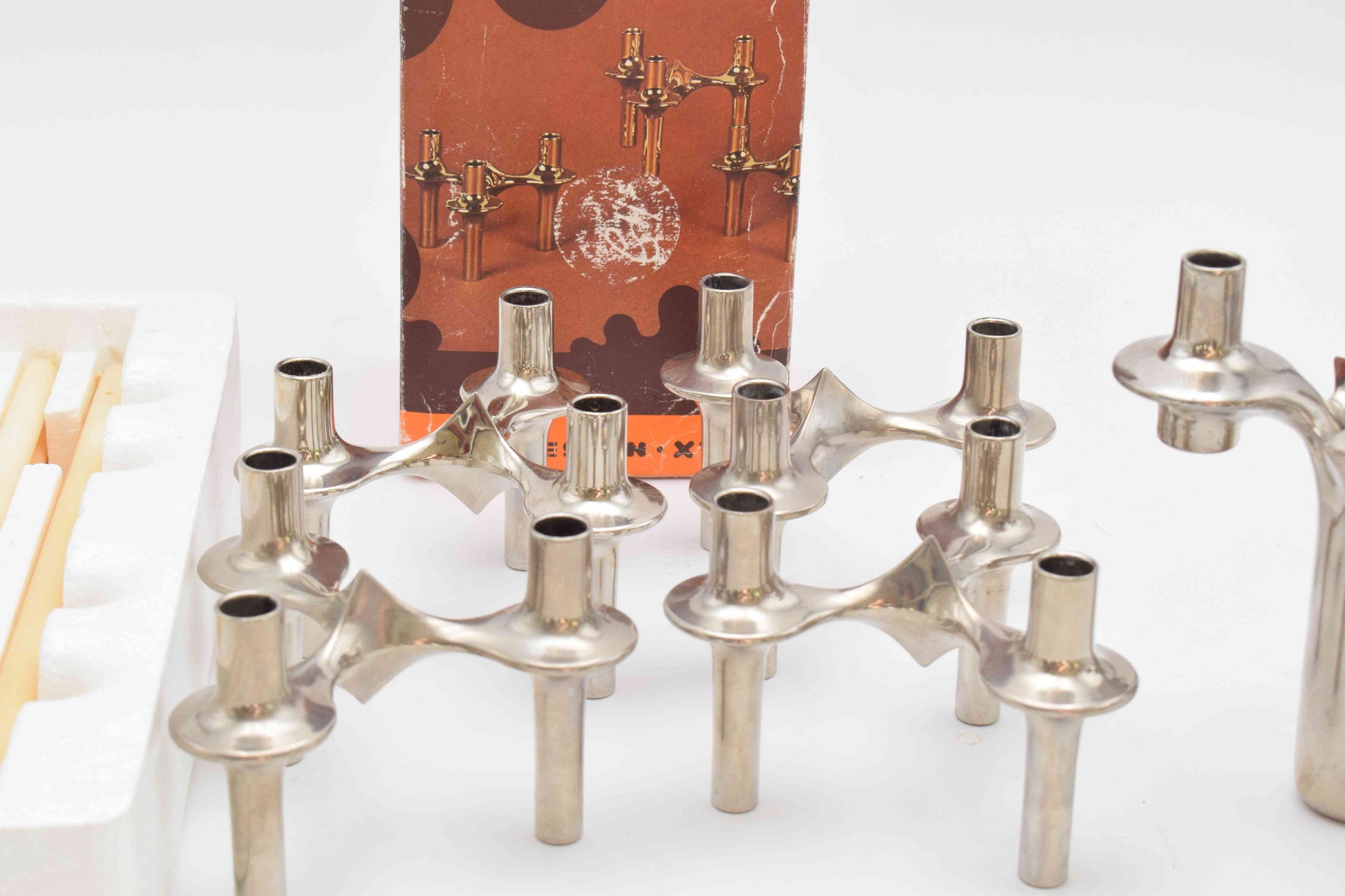 candle holders, nagel, eames era, candles, candle sticks, space age, mid century, midcentury modern, BMF, mad men, chrome home decor, MICHAEL ARAM, AERIN lauder