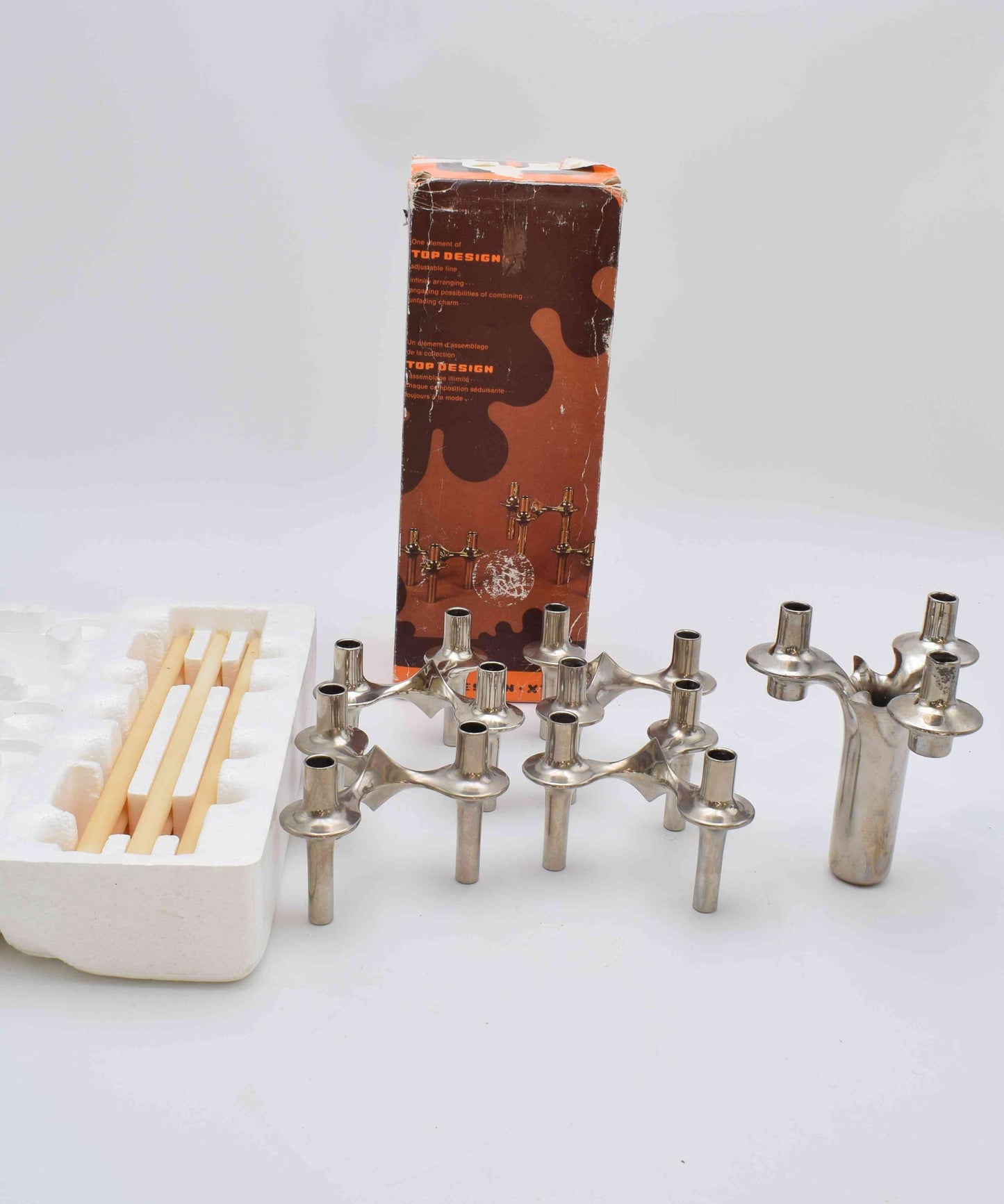 candle holders, nagel, eames era, candles, candle sticks, space age, mid century, midcentury modern, BMF, mad men, chrome home decor, MICHAEL ARAM, AERIN lauder