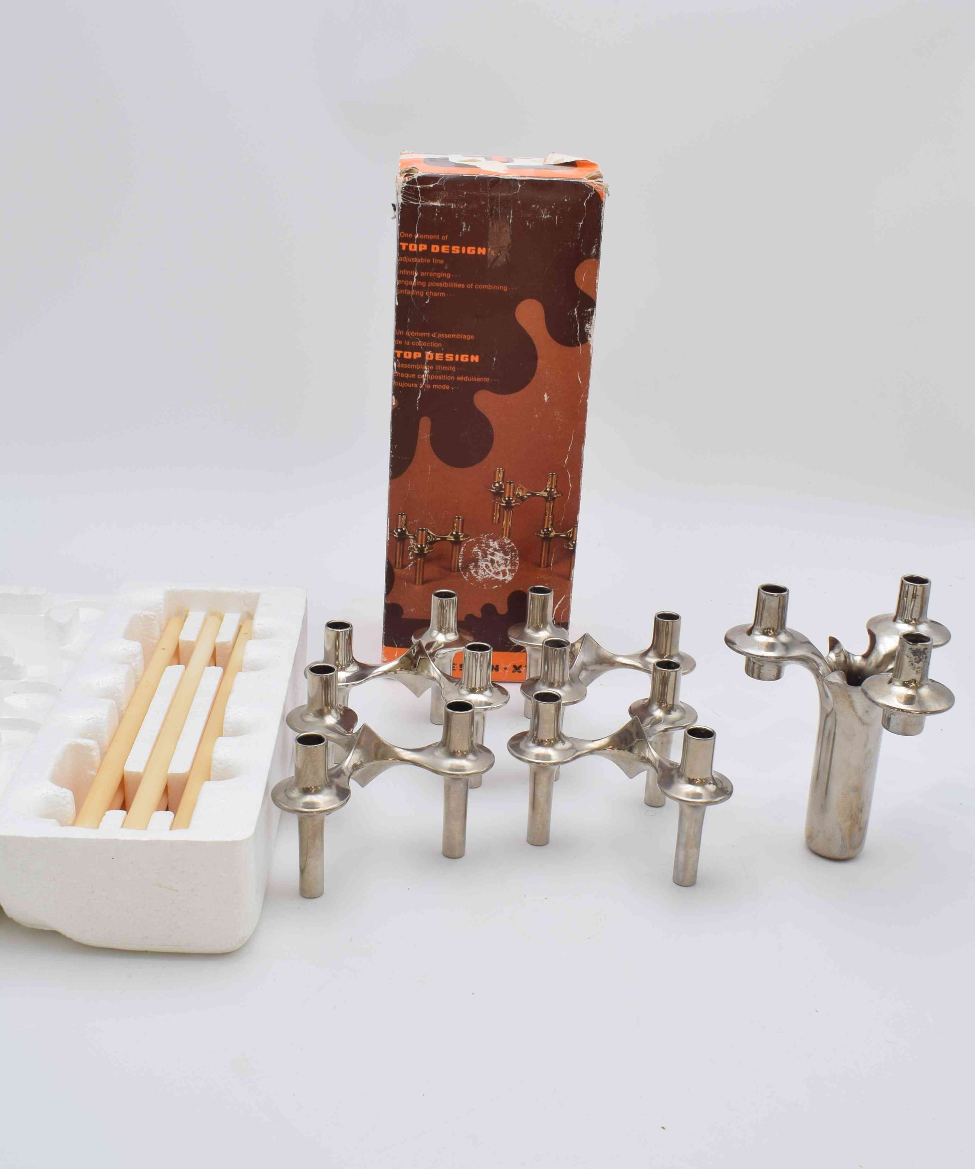 candle holders, nagel, eames era, candles, candle sticks, space age, mid century, midcentury modern, BMF, mad men, chrome home decor, MICHAEL ARAM, AERIN lauder