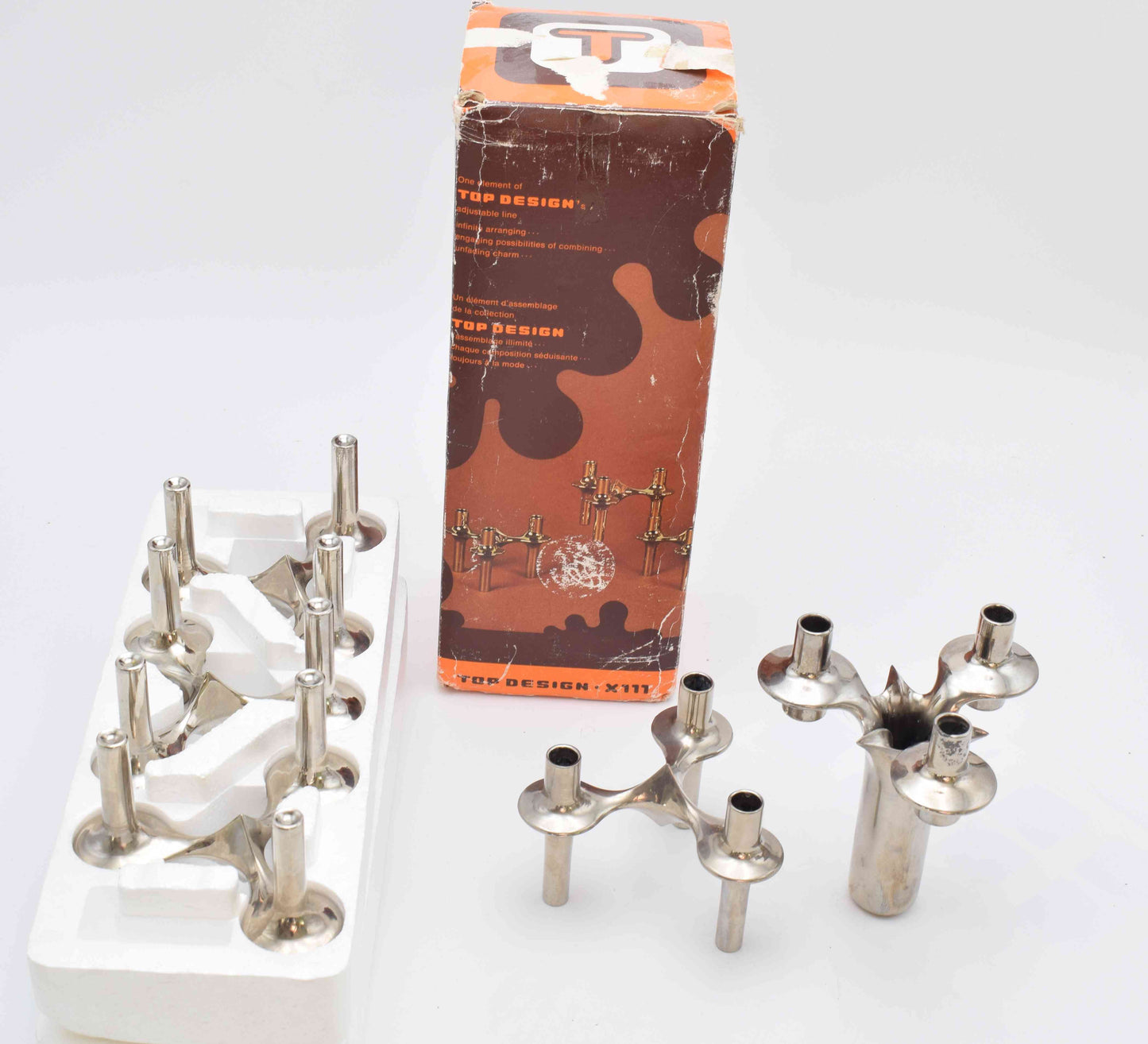 candle holders, nagel, eames era, candles, candle sticks, space age, mid century, midcentury modern, BMF, mad men, chrome home decor, MICHAEL ARAM, AERIN lauder