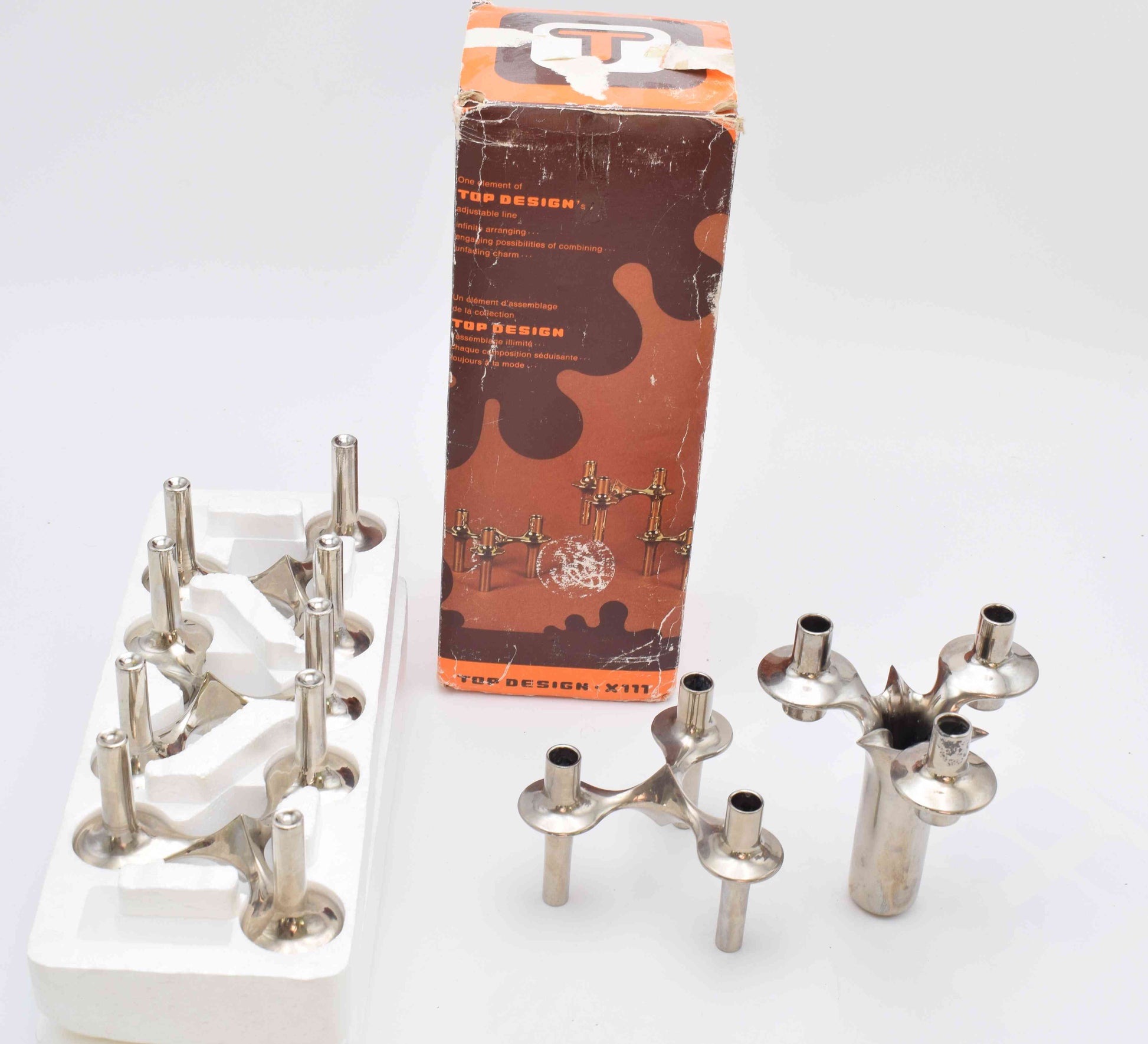 candle holders, nagel, eames era, candles, candle sticks, space age, mid century, midcentury modern, BMF, mad men, chrome home decor, MICHAEL ARAM, AERIN lauder